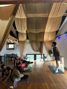 Wellness class taking place in the upper brwnbox event space